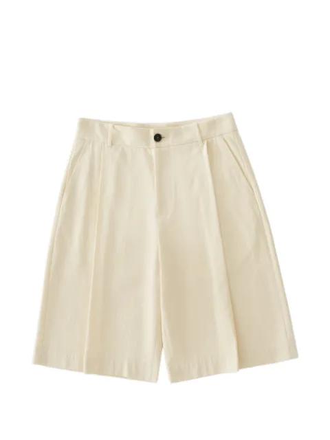 Fowld pleat herringbone shorts by STUDIO NICHOLSON