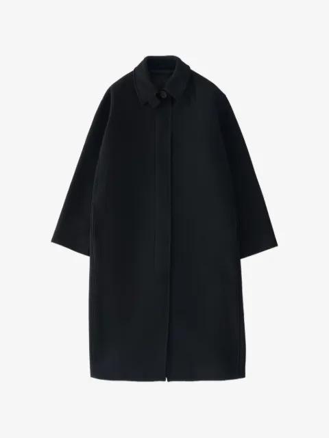concealed-button A-line coat by STUDIO NICHOLSON