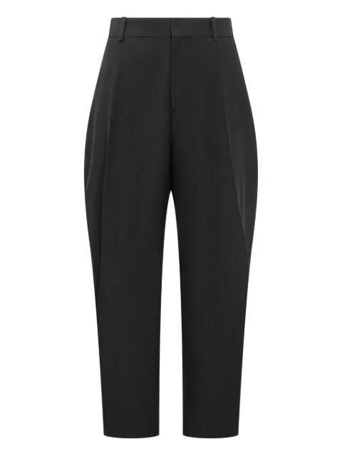 curved full-length trousers by STUDIO NICHOLSON