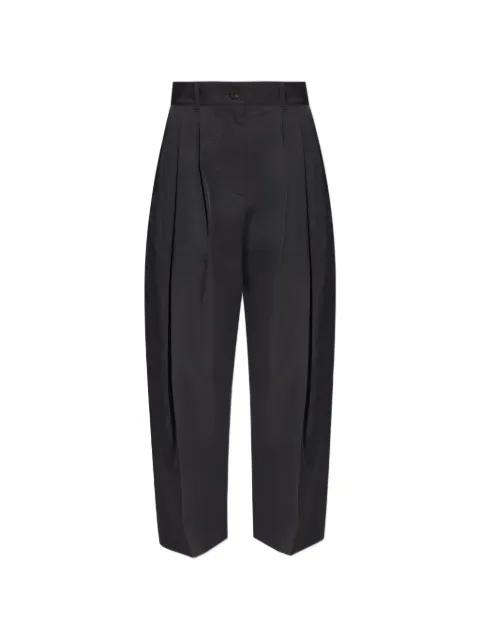 pleated acuna trousers by STUDIO NICHOLSON