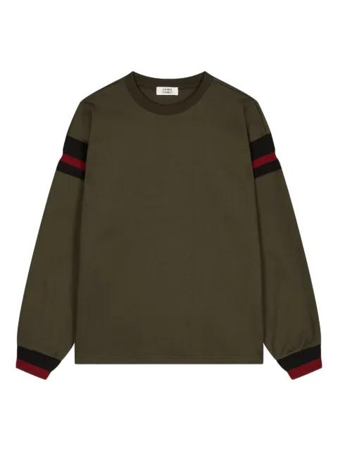 armband long-sleeve top by STUDIO TOMBOY