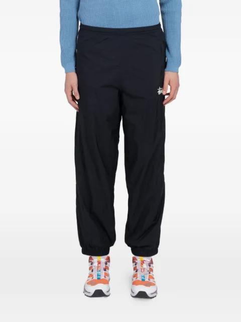 logo-print track pants by STUSSY