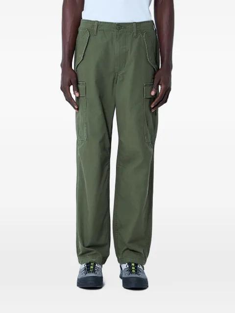 multi-pocket cargo pants by STUSSY