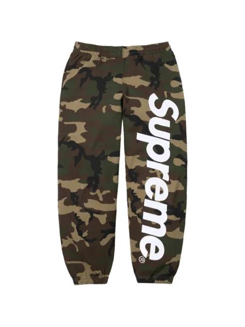 satin-appliqué camouflage-print track pants by SUPREME