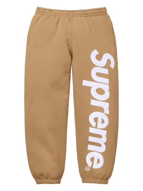 satin-appliqué track pants by SUPREME