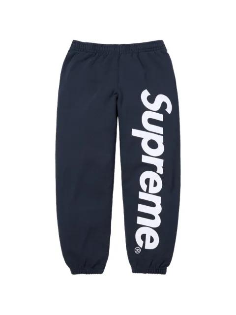 satin-appliqué track pants by SUPREME