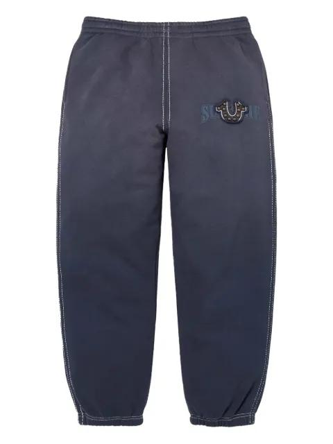 x True Religion logo-detail track pants by SUPREME