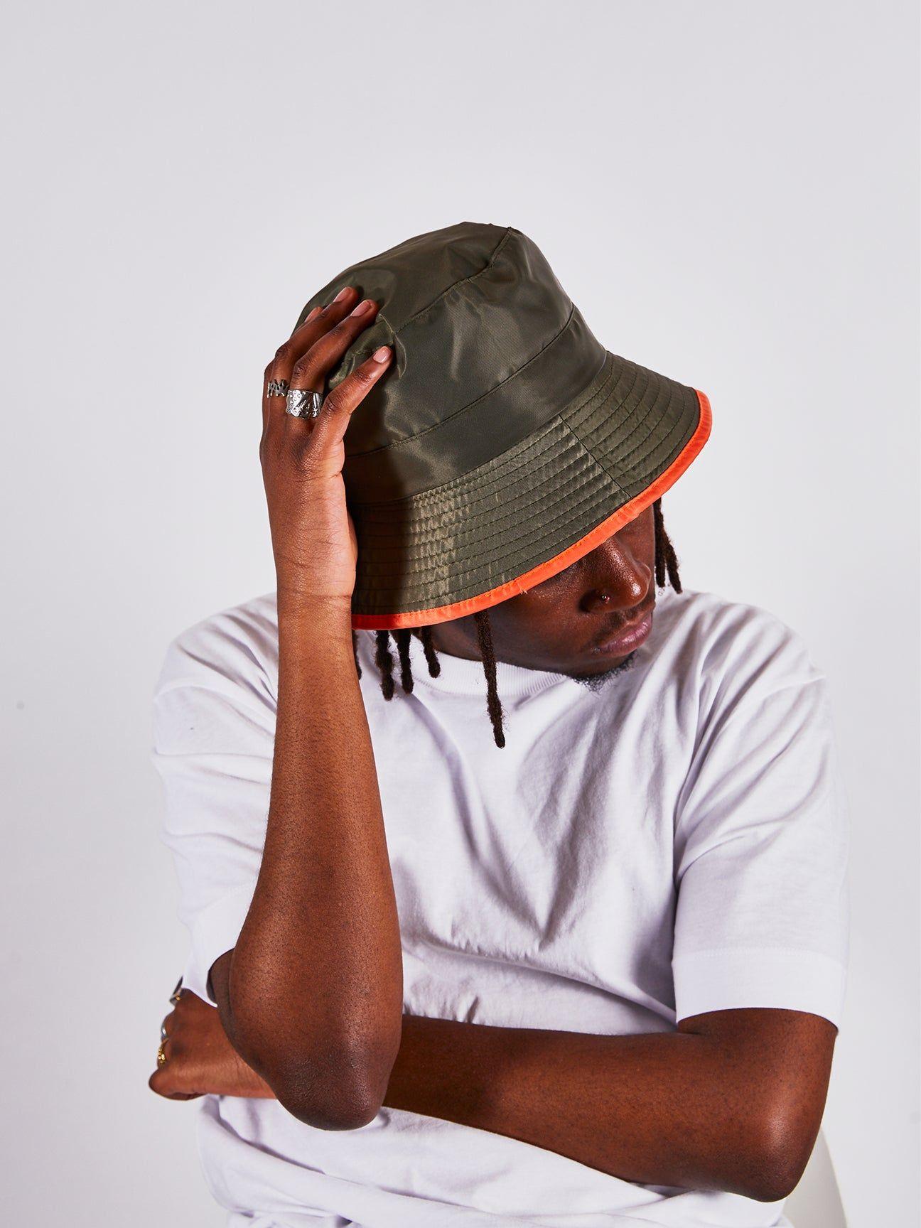 Nylon Bucket Hat With Contrast Trim And Drawstring In Moss by SVNX