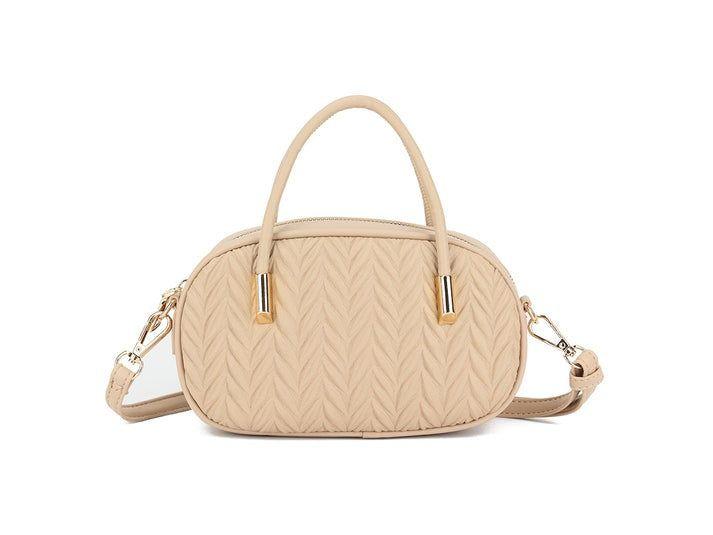 Textured Oval Top Handle Crossbody Bag in Beige by SVNX