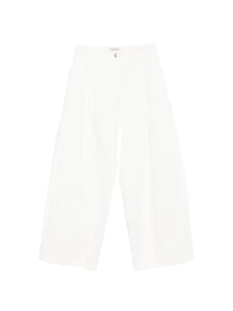 button-fastening pleated jeans by SYSTEM