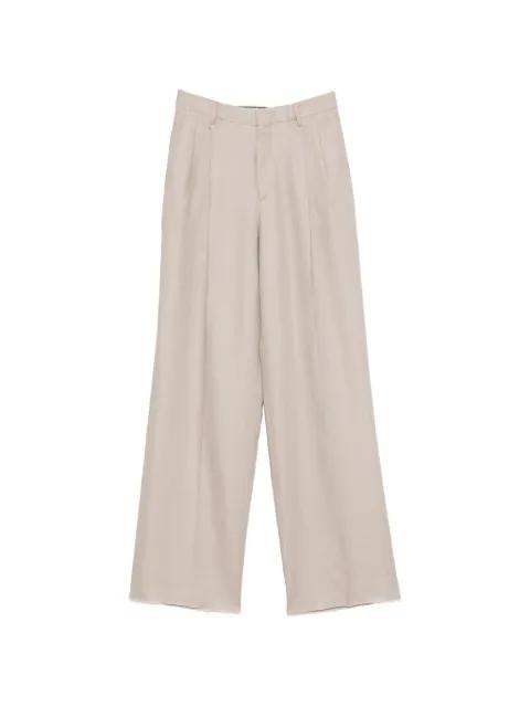 Ebony pleated linen trousers by TAGLIATORE