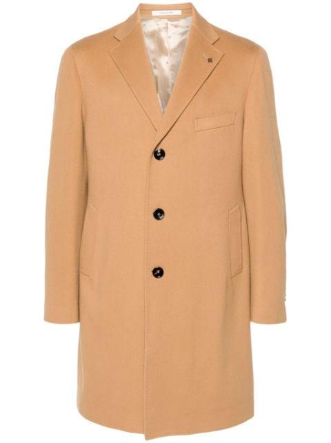 brooch-detail coat by TAGLIATORE