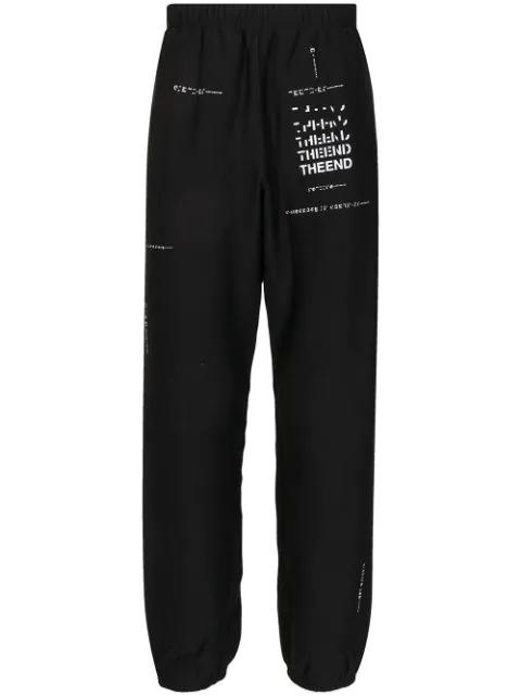 slogan-print track pants by TAKAHIROMIYASHITA THE SOLOIST