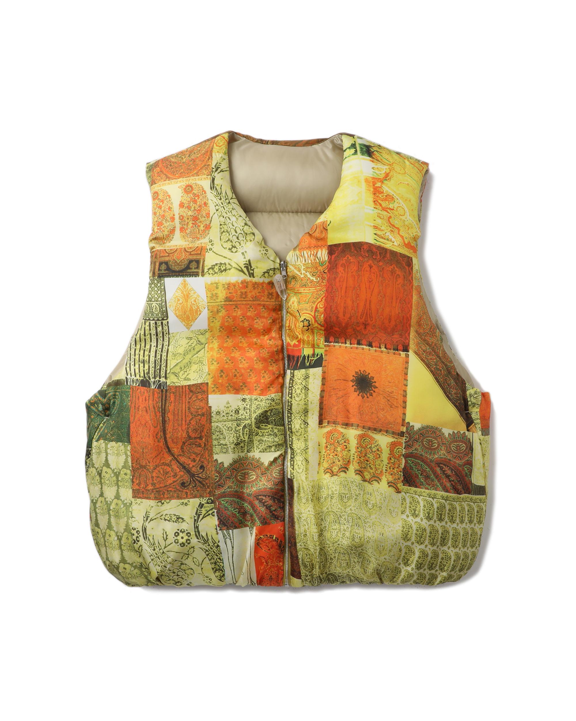 Reversible down vest by TANAKA