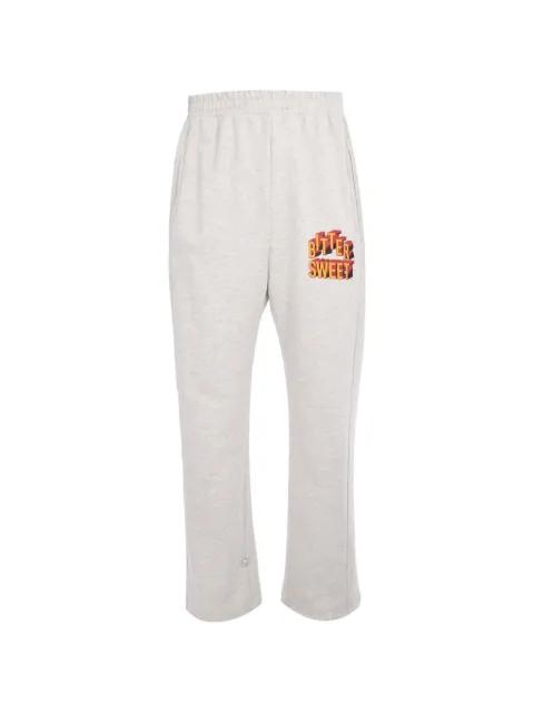 Bittersweet graphic-print track pants by TEE LIBRARY
