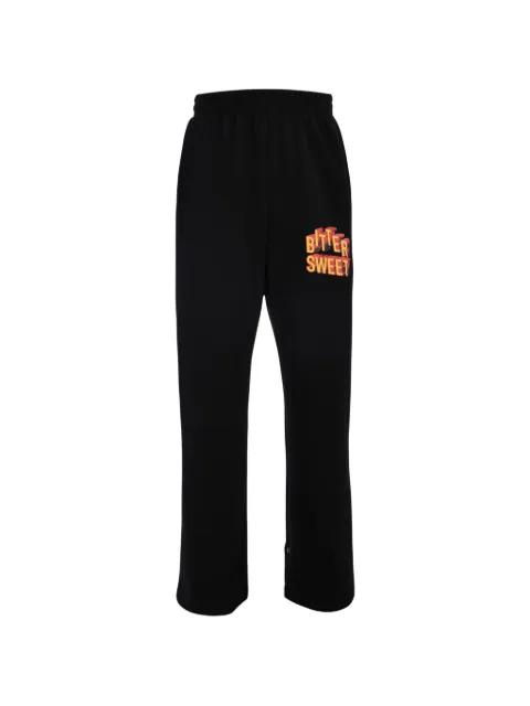 Bittersweet graphic-print track pants by TEE LIBRARY