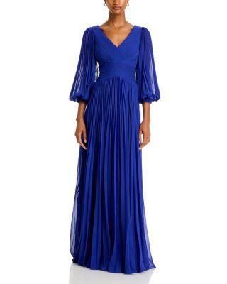 Chiffon Pleated V Neck Gown by TERI JON BY RICKIE FREEMAN