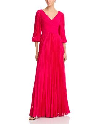 Chiffon Pleated V Neck Gown by TERI JON BY RICKIE FREEMAN