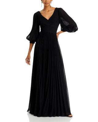 Chiffon Pleated V Neck Gown by TERI JON BY RICKIE FREEMAN