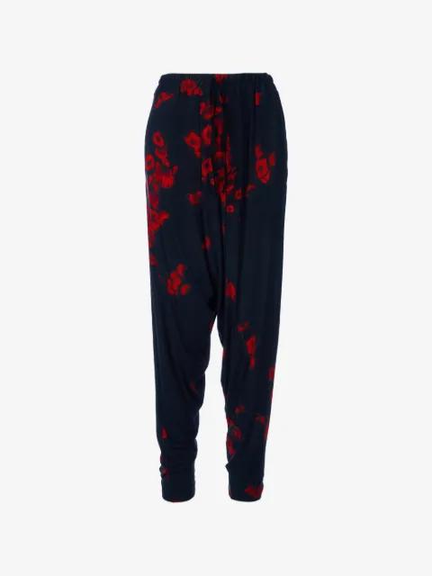 Poppies Folds low-crotch floral-print trousers by TESSITURA