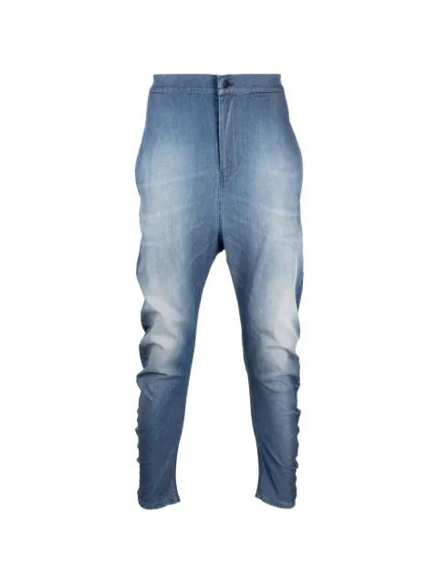 Twisted slim-fit tapered jeans by TESSITURA