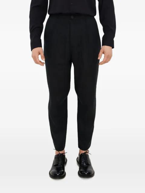 linen tapered trousers by TESSITURA