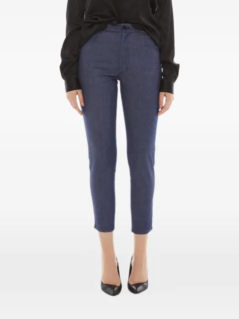 pyramid-stud tapered jeans by TESSITURA