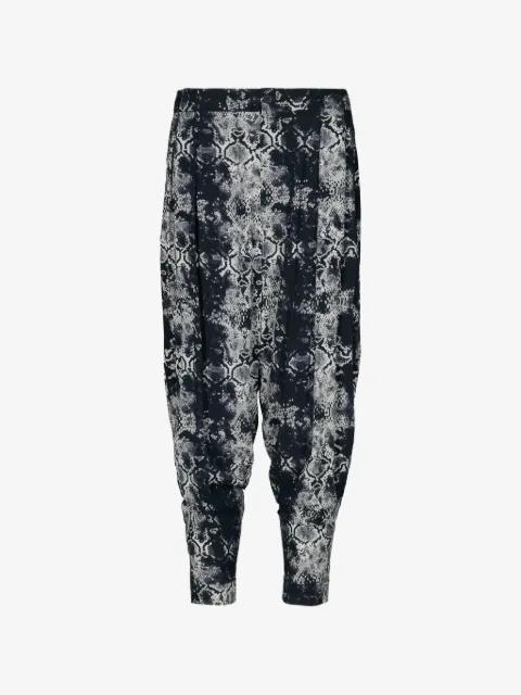 snakeskin-print tapered trousers by TESSITURA