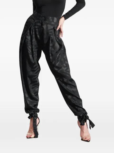tapered adjustable-ankle trousers by TESSITURA