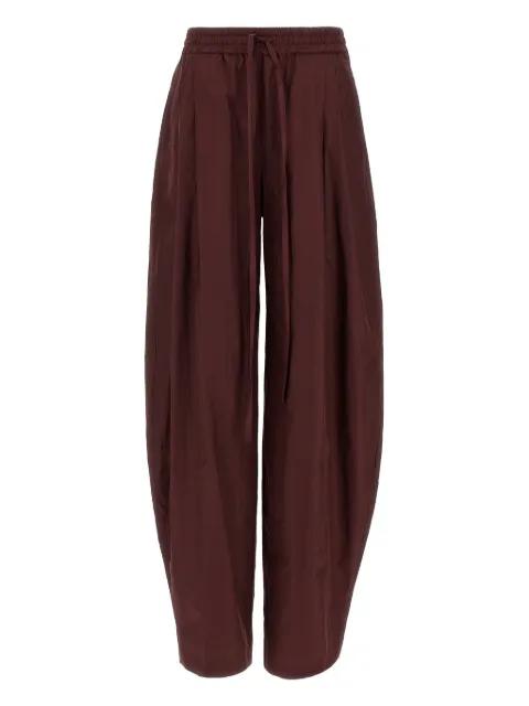 pleated tapered trousers by THE ANDAMANE