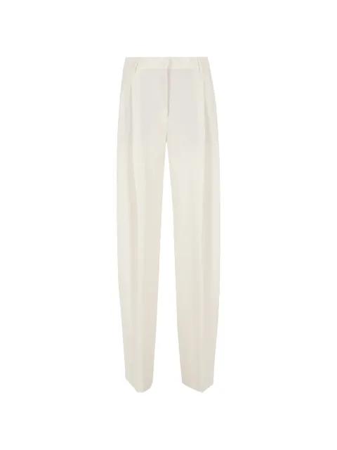 pleated trousers by THE ANDAMANE