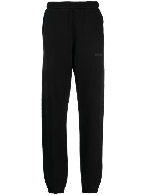 Penny logo-embossed cotton track pants by THE ATTICO
