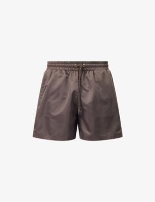 Emblem Water Reactive Woven Swim Shorts by THE COUTURE CLUB
