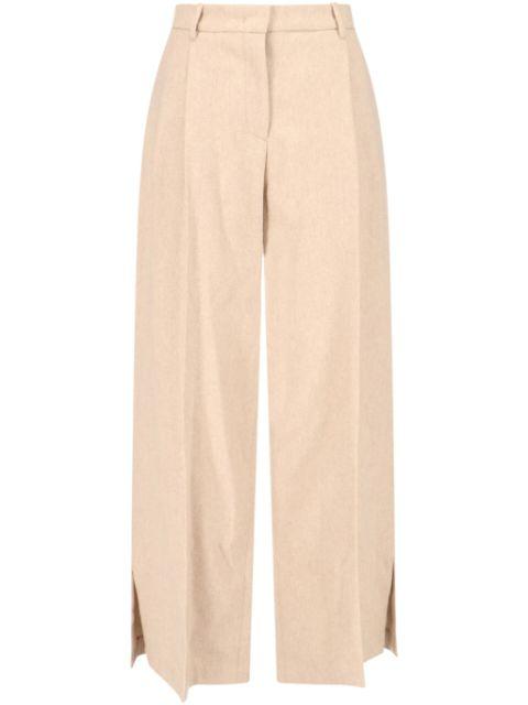 side slit trousers by THE GARMENT