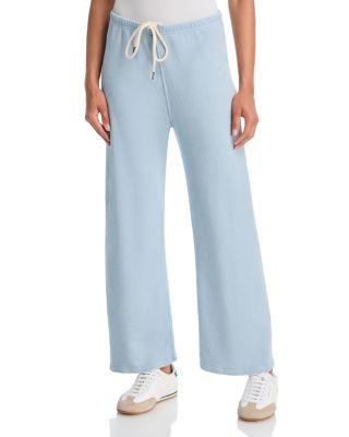 The Lap Cropped Flare Sweatpants by THE GREAT