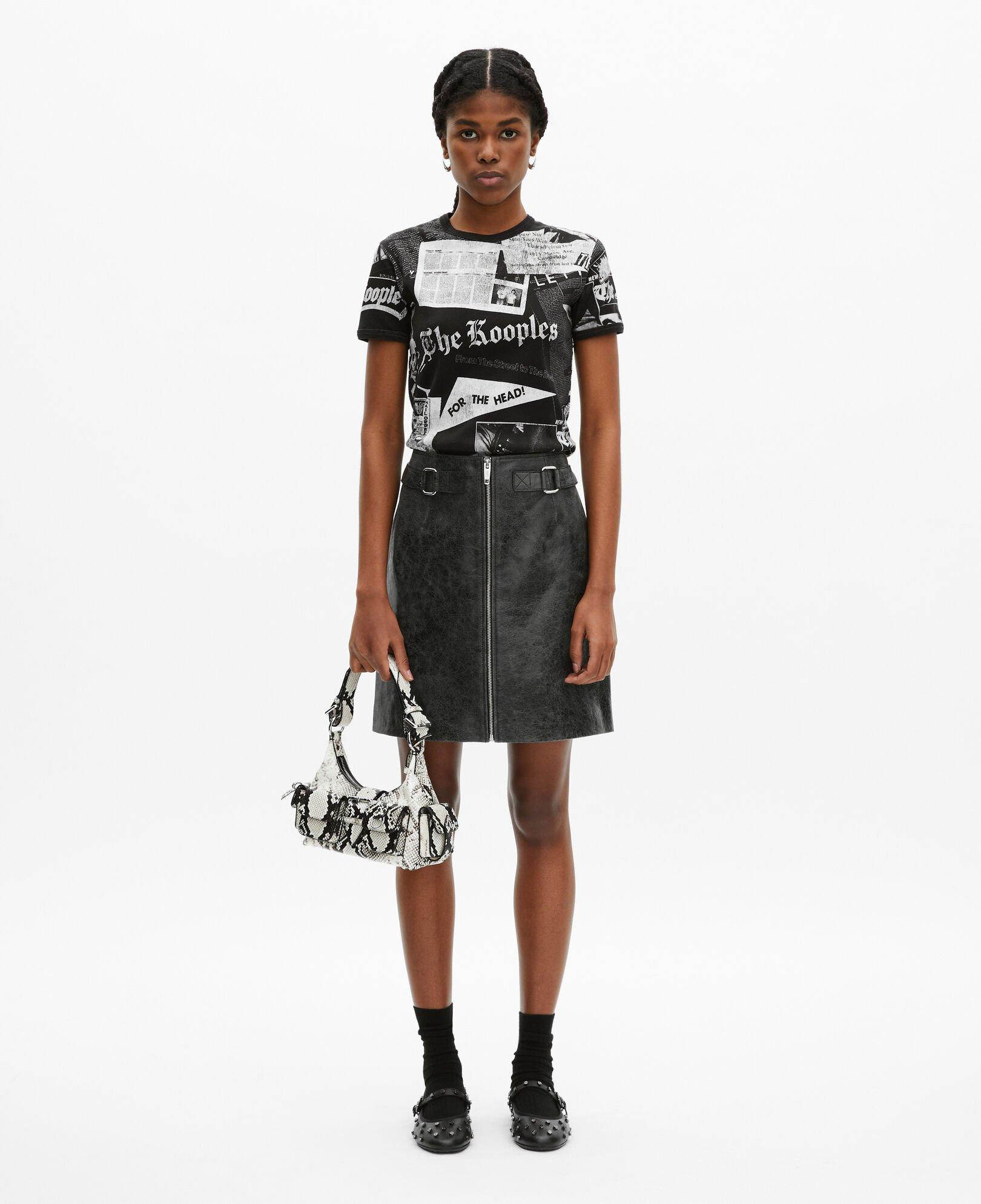 Black leather zipped short skirt by THE KOOPLES