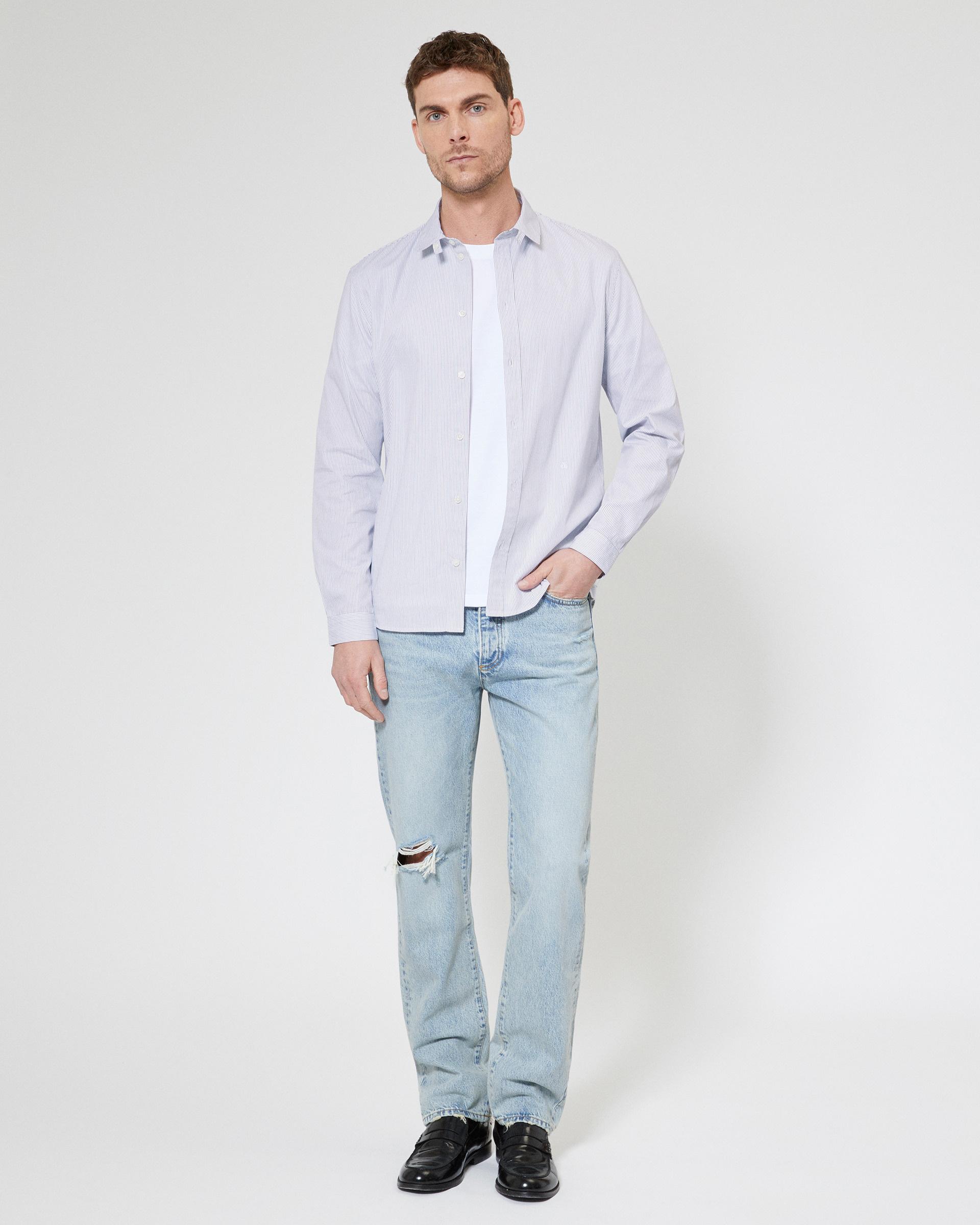 Light blue washed straight jeans by THE KOOPLES
