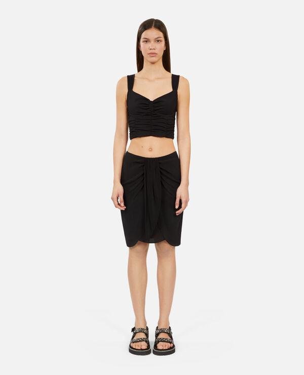 Short black draped washed silk skirt by THE KOOPLES