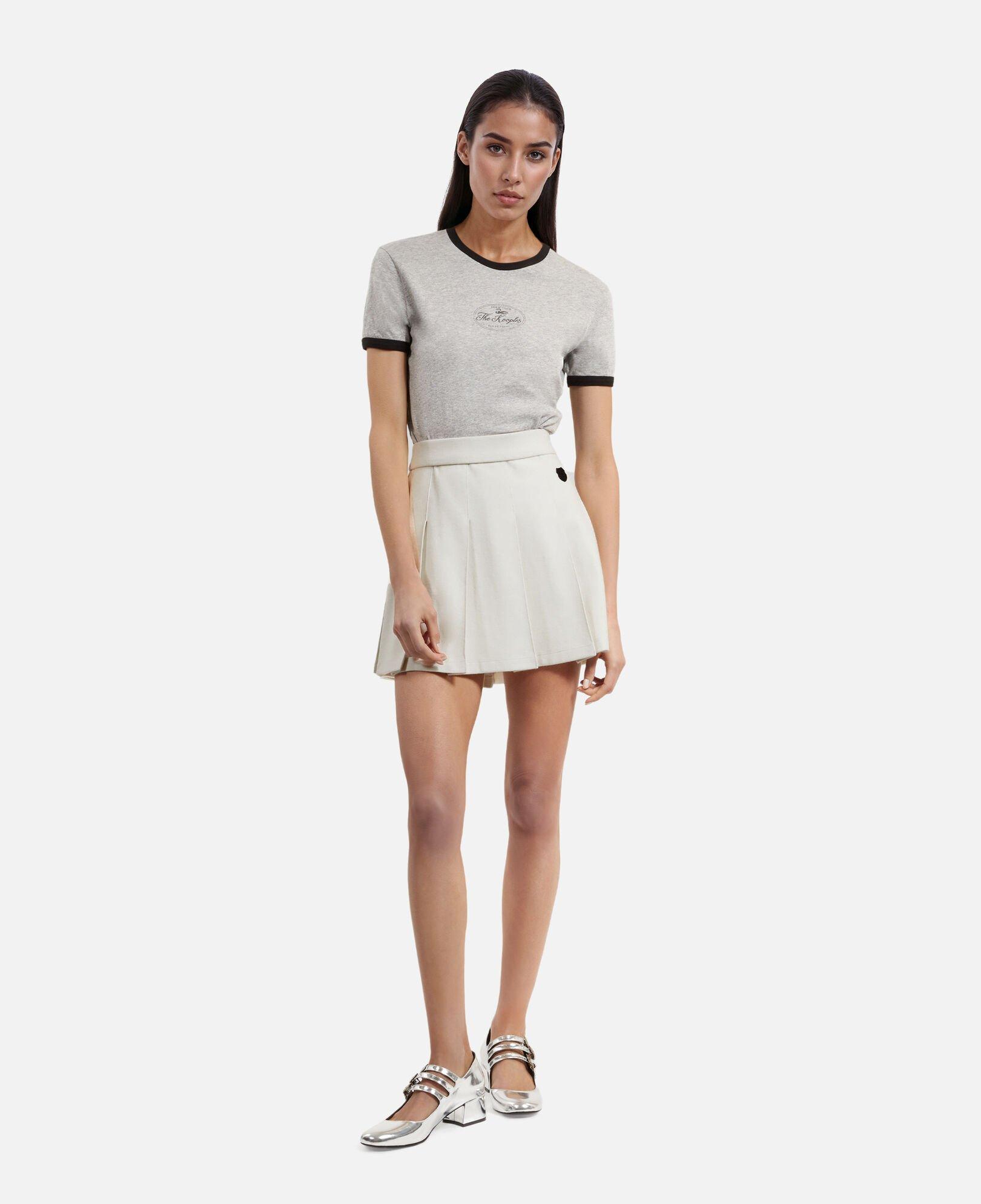 Short ecru pleated skirt by THE KOOPLES