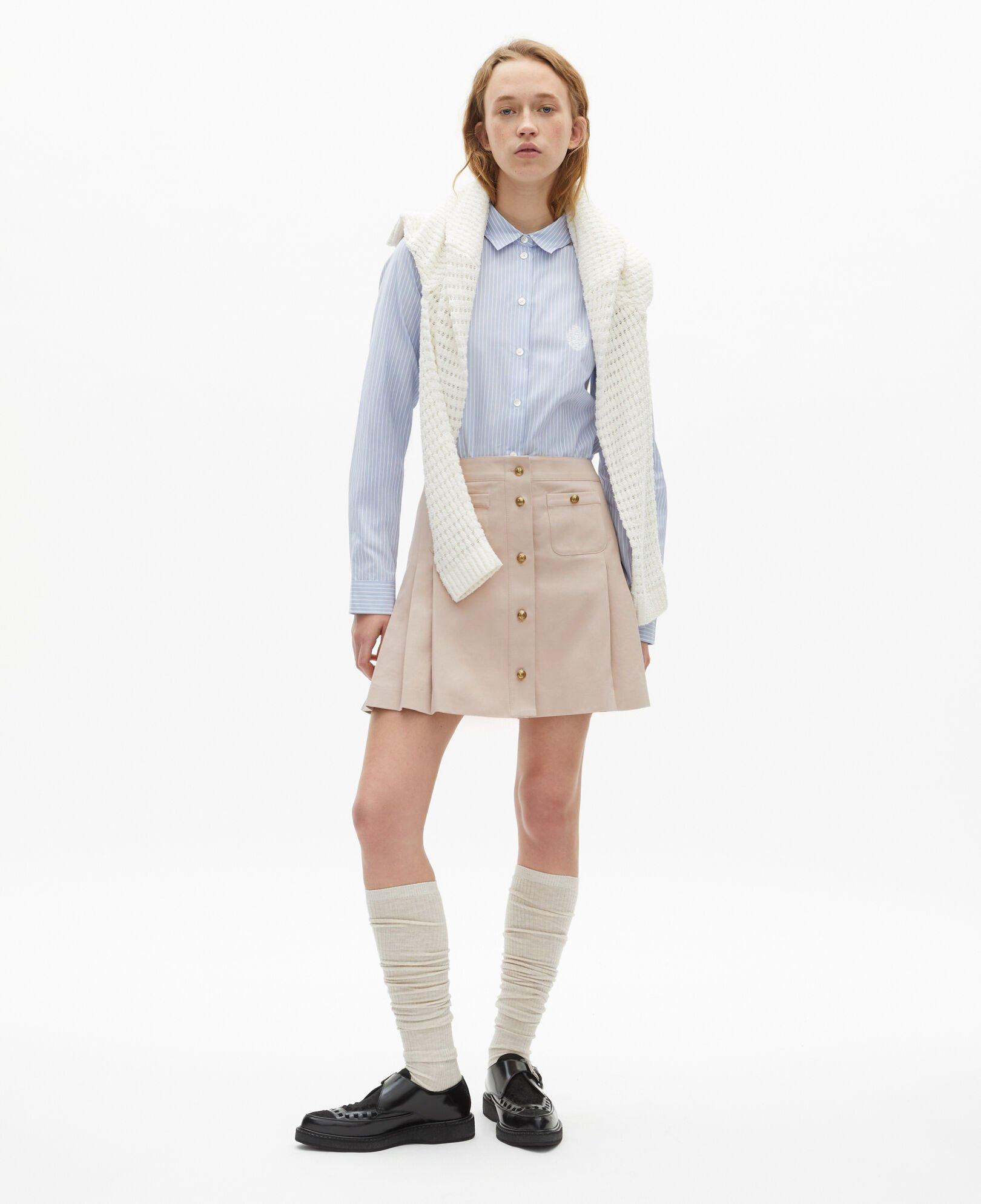 Short pleated skirt in light pink by THE KOOPLES