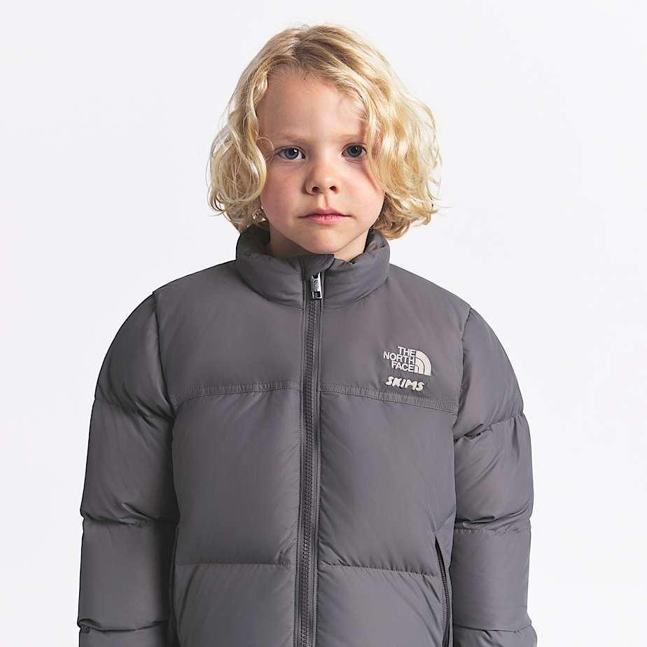 Kids' X Skims 1996 Nuptse Jacket Sk Gunmetal by THE NORTH FACE