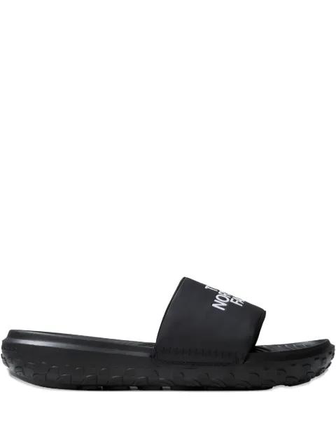 Never Stop logo-embossed textured slides by THE NORTH FACE