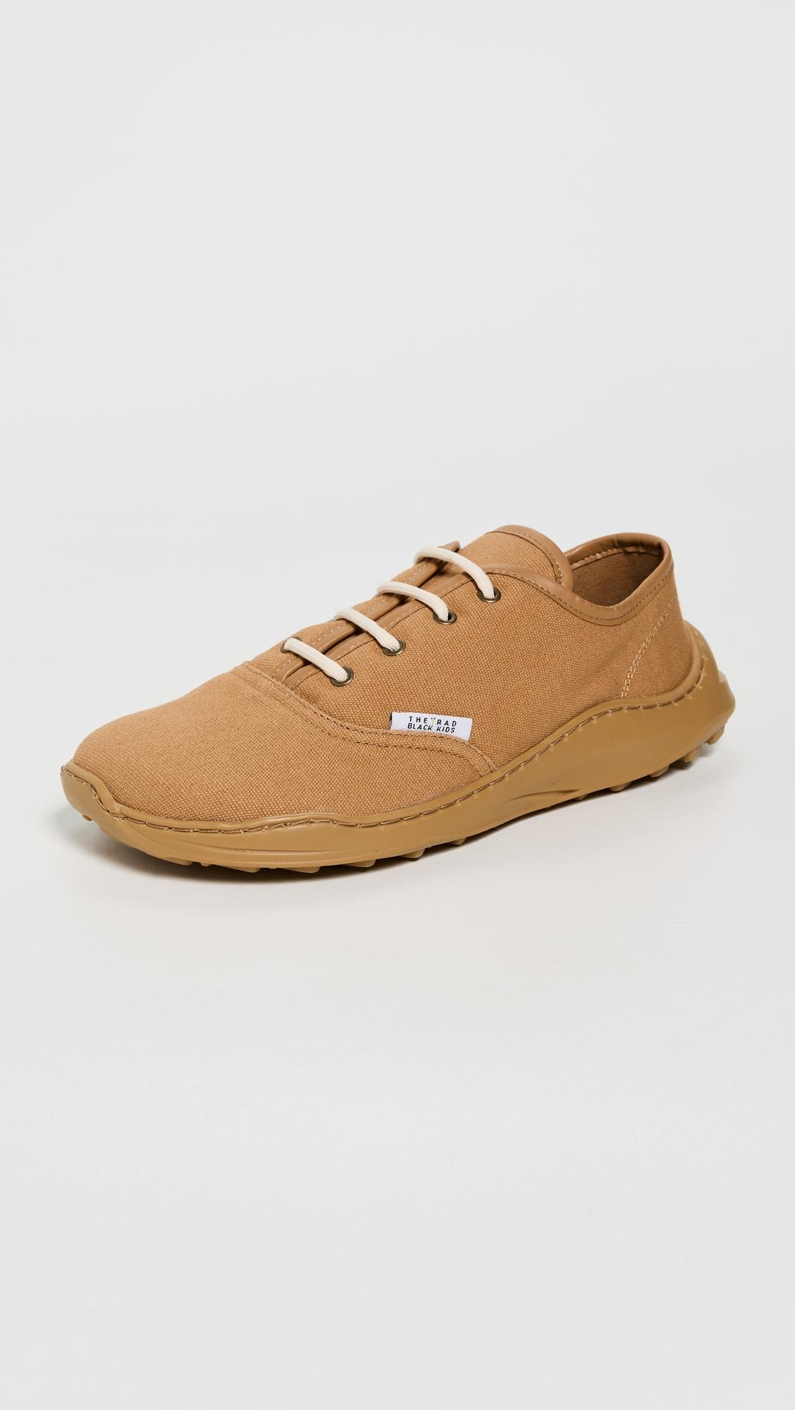 Skate Plimsoll Unisex Sneakers by THE RAD BLACK KIDS