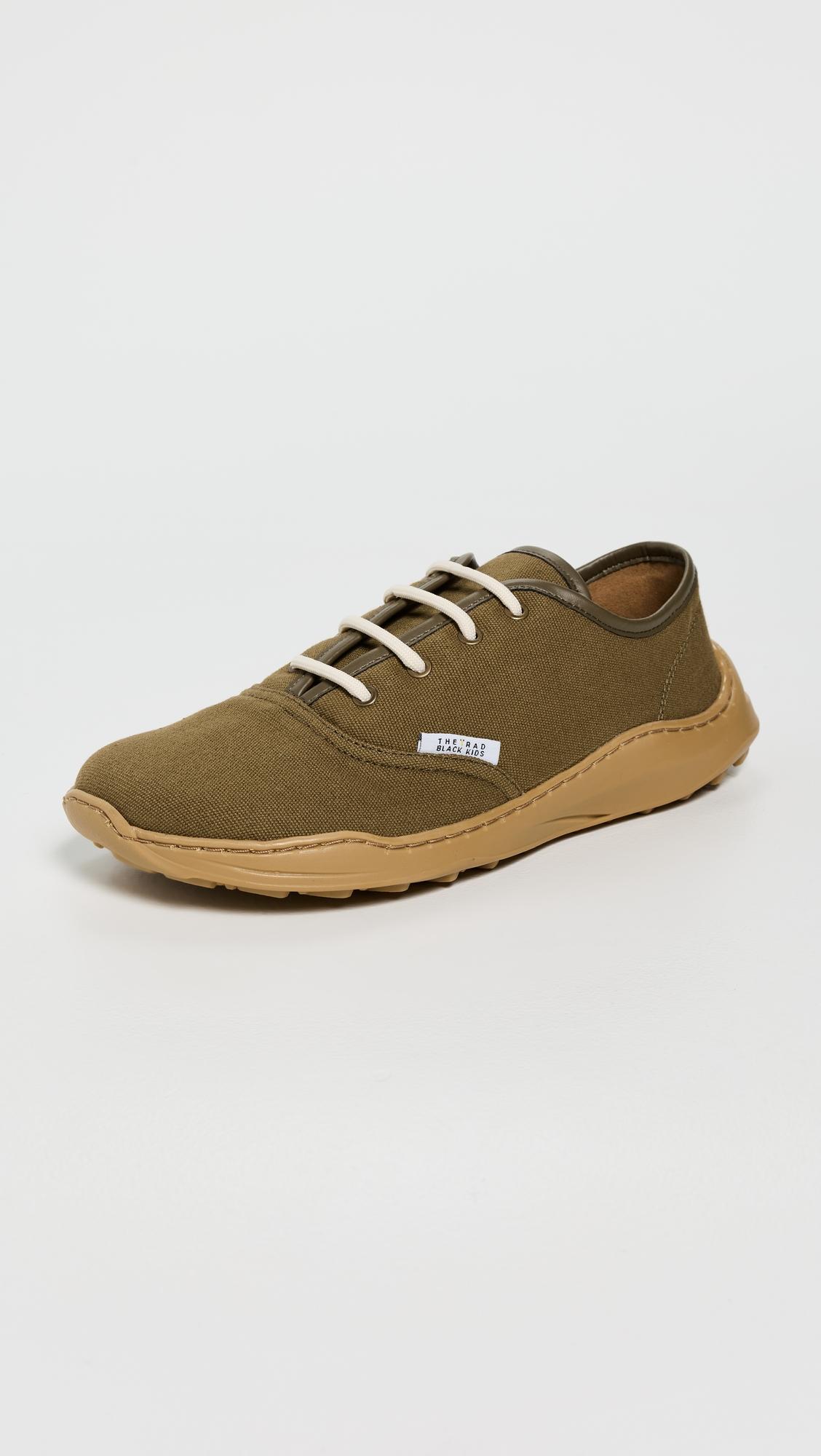 Skate Plimsoll Unisex Sneakers by THE RAD BLACK KIDS