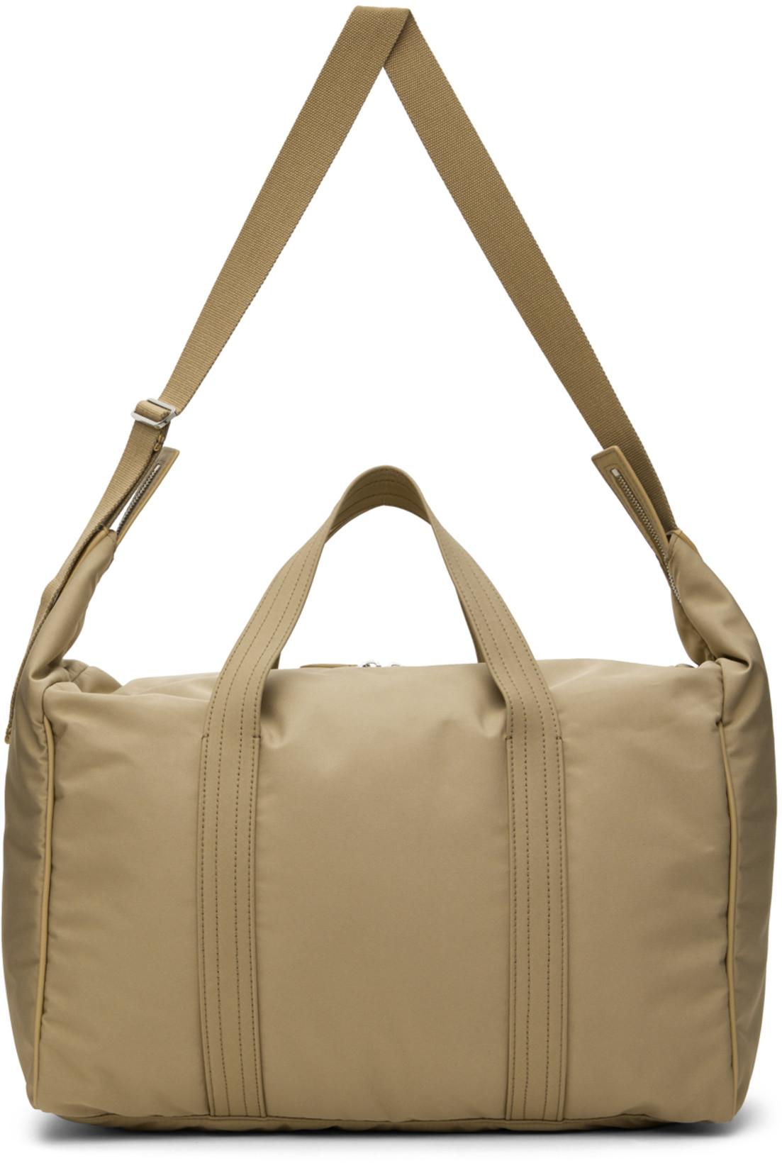 Beige Logan Duffle Bag by THE ROW