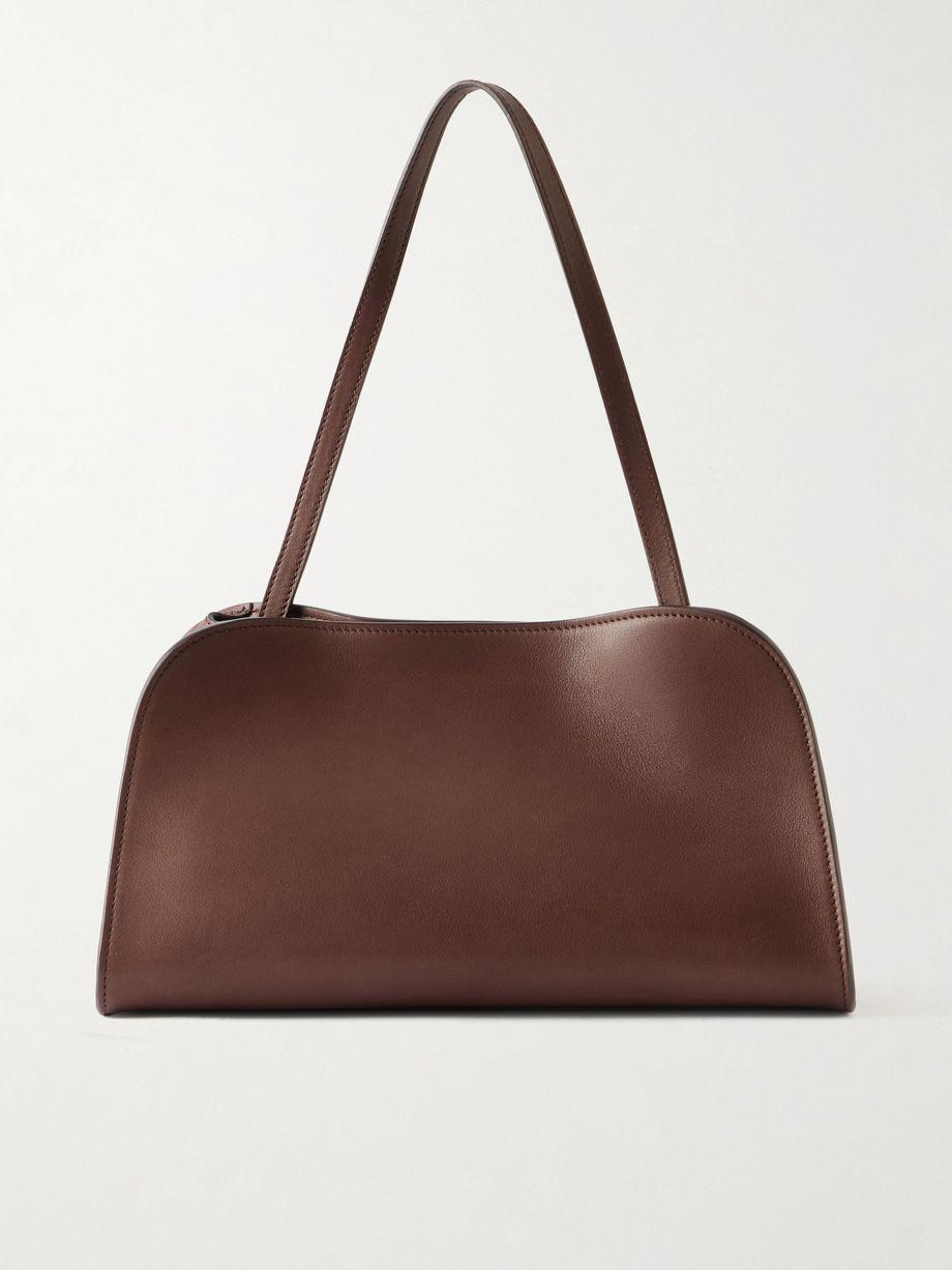 Peggy leather clutch by THE ROW