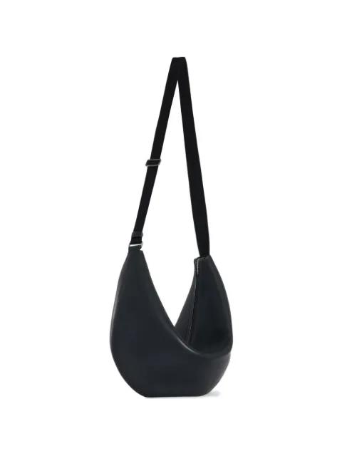 crescent-shaped leather shoulder bag by THE ROW