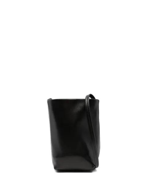 leather cross body bag by THE ROW