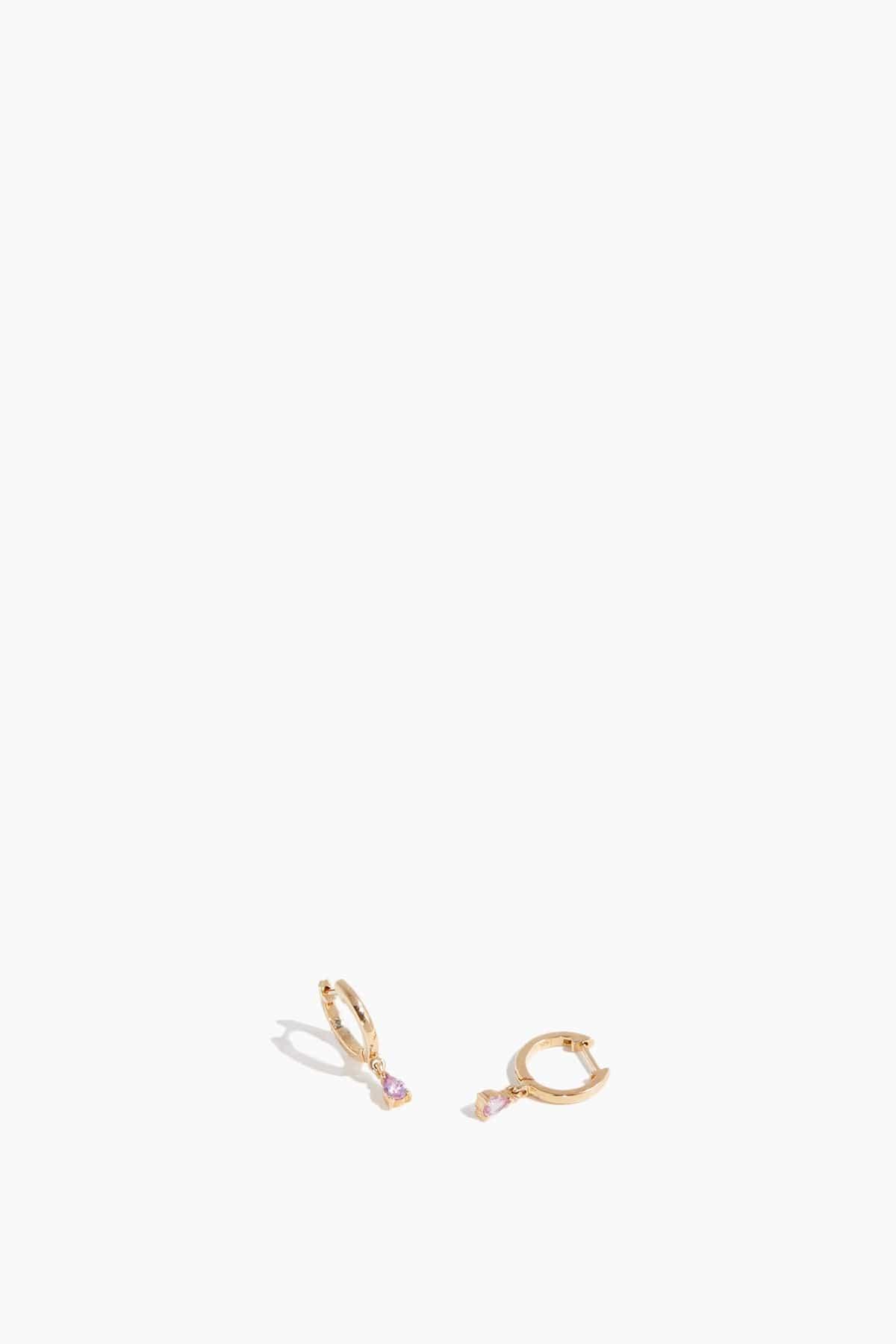 Pink Sapphire Drop Huggies in 14k Yellow Gold by THEODOSIA