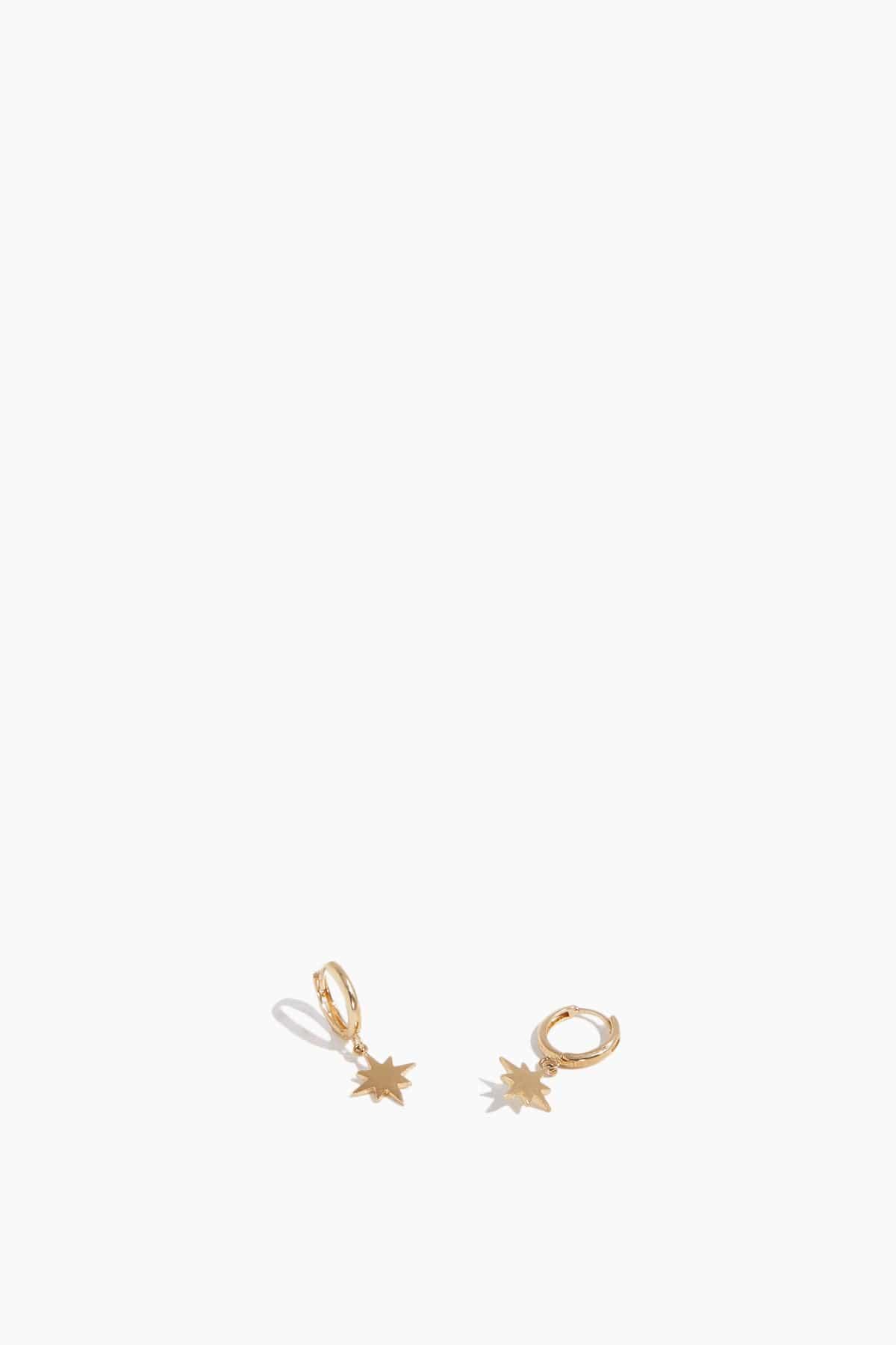 Starburst Drop Huggies in 14k Yellow Gold by THEODOSIA